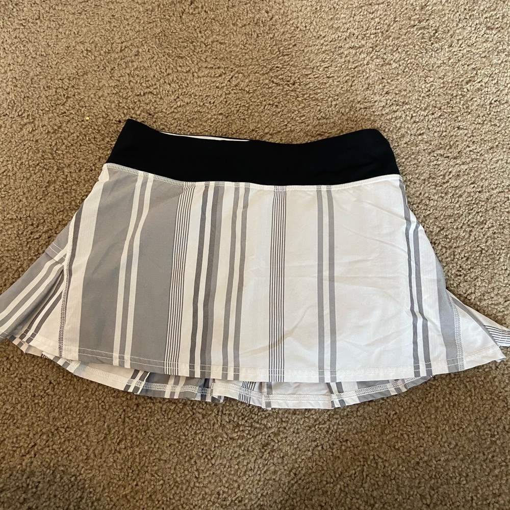 Black and white striped golf/tennis skirt.
